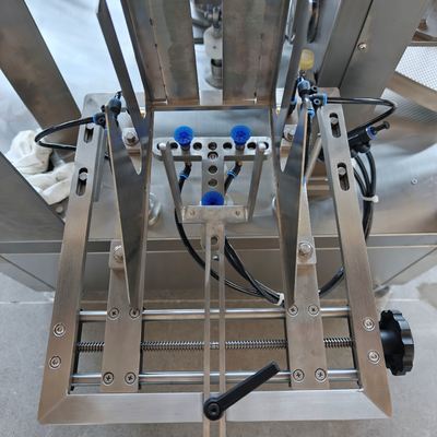 Bag pickup station â robotic arm taking a premade pouch